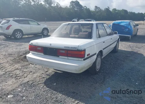 1989 Toyota Camry Le z USA, uszkodzony, nr VIN JT2VV22E3K0080031